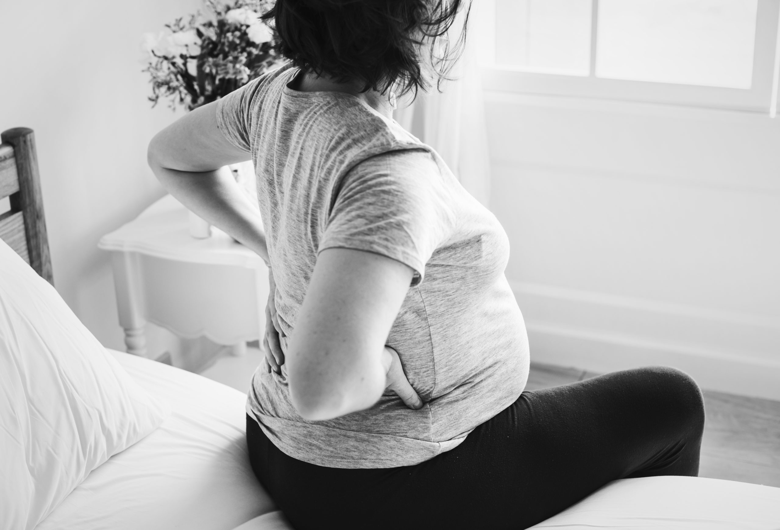 Резкая боль в спине при беременности